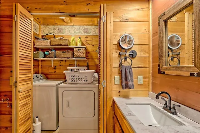 a utility room with dryer and washer