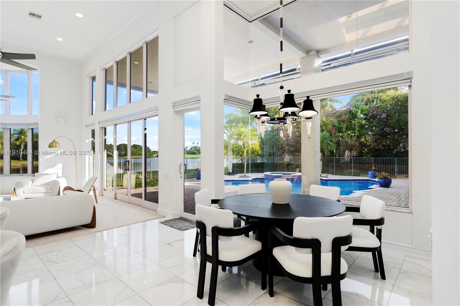 2939 Paddock Lane Weston, FL 33331 - Photo 11 of 59 a living room with furniture and a large window
