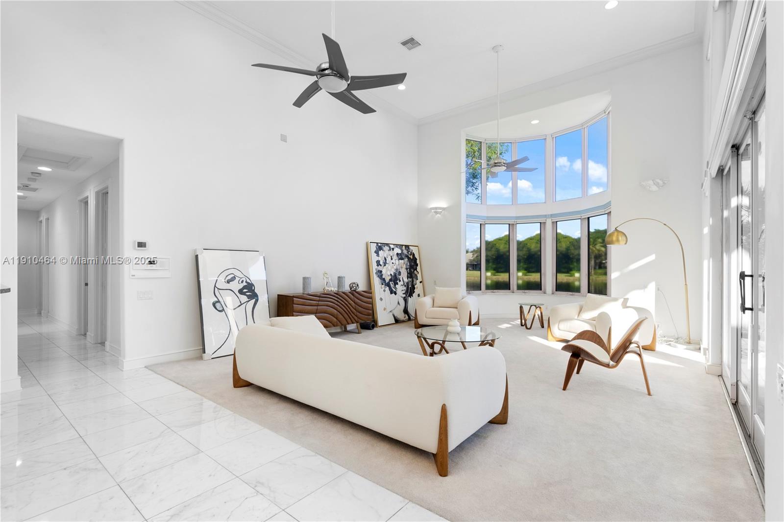 2939 Paddock Lane Weston, FL 33331 - Photo 14 of 59 a living room with furniture and a large window