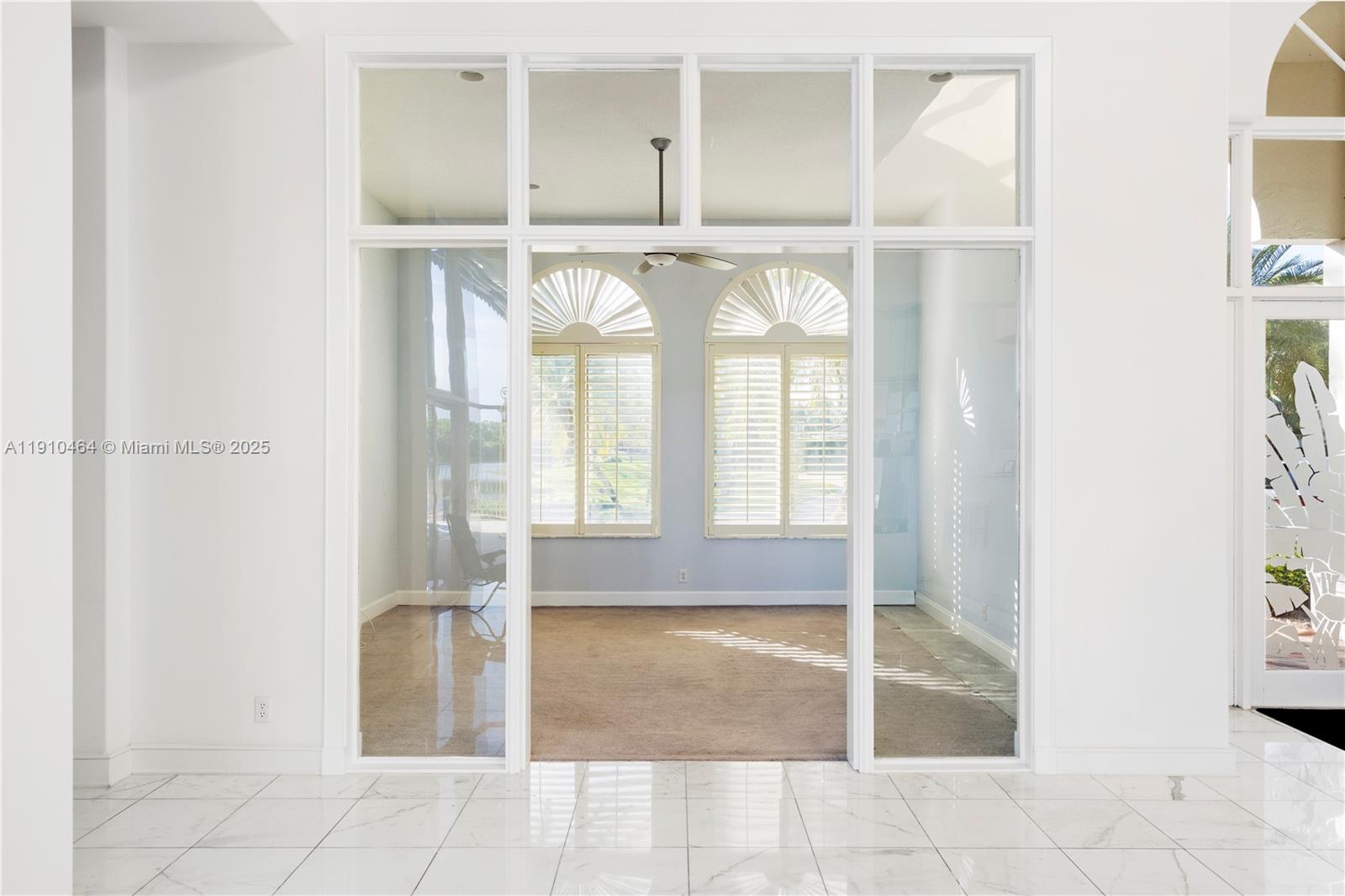 2939 Paddock Lane Weston, FL 33331 - Photo 26 of 59 a view of an empty room with windows