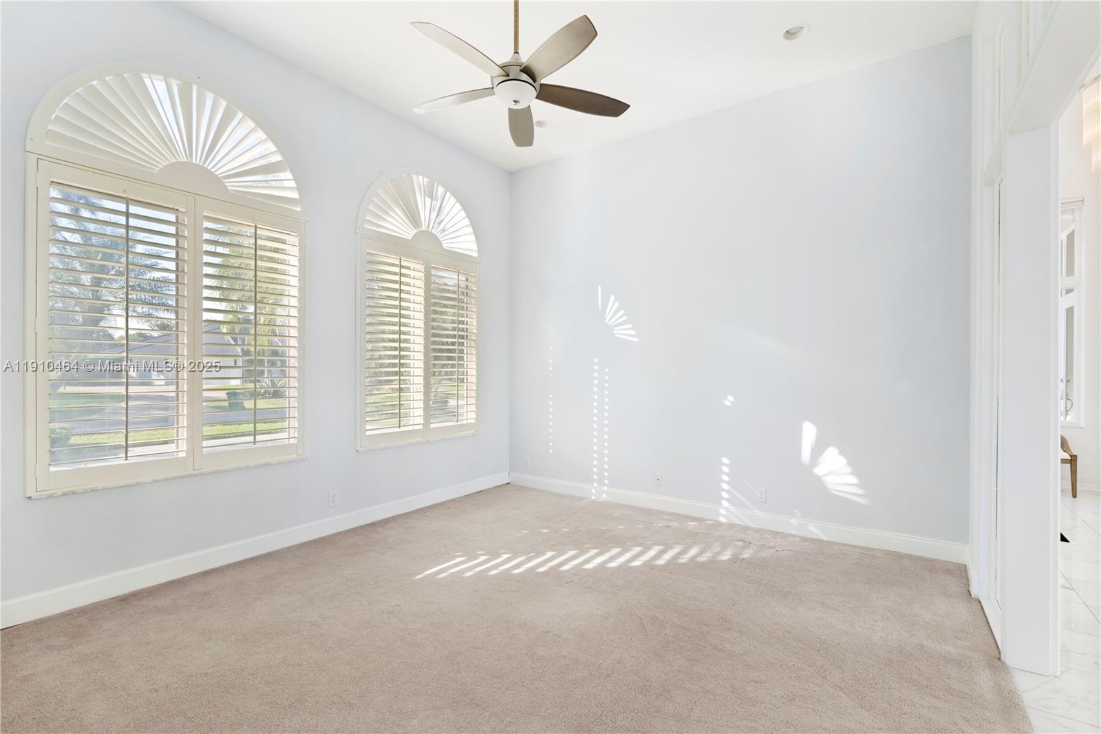 2939 Paddock Lane Weston, FL 33331 - Photo 28 of 59 a view of an empty room with a window