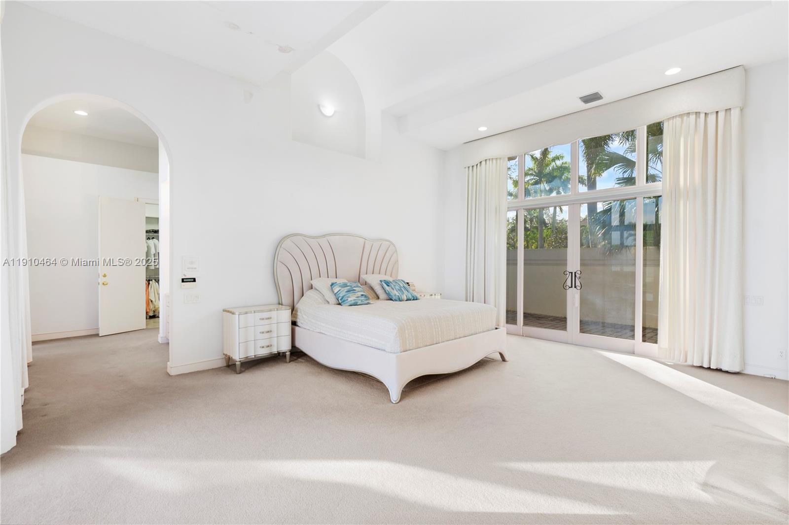 2939 Paddock Lane Weston, FL 33331 - Photo 32 of 59 a living room with furniture and a large window