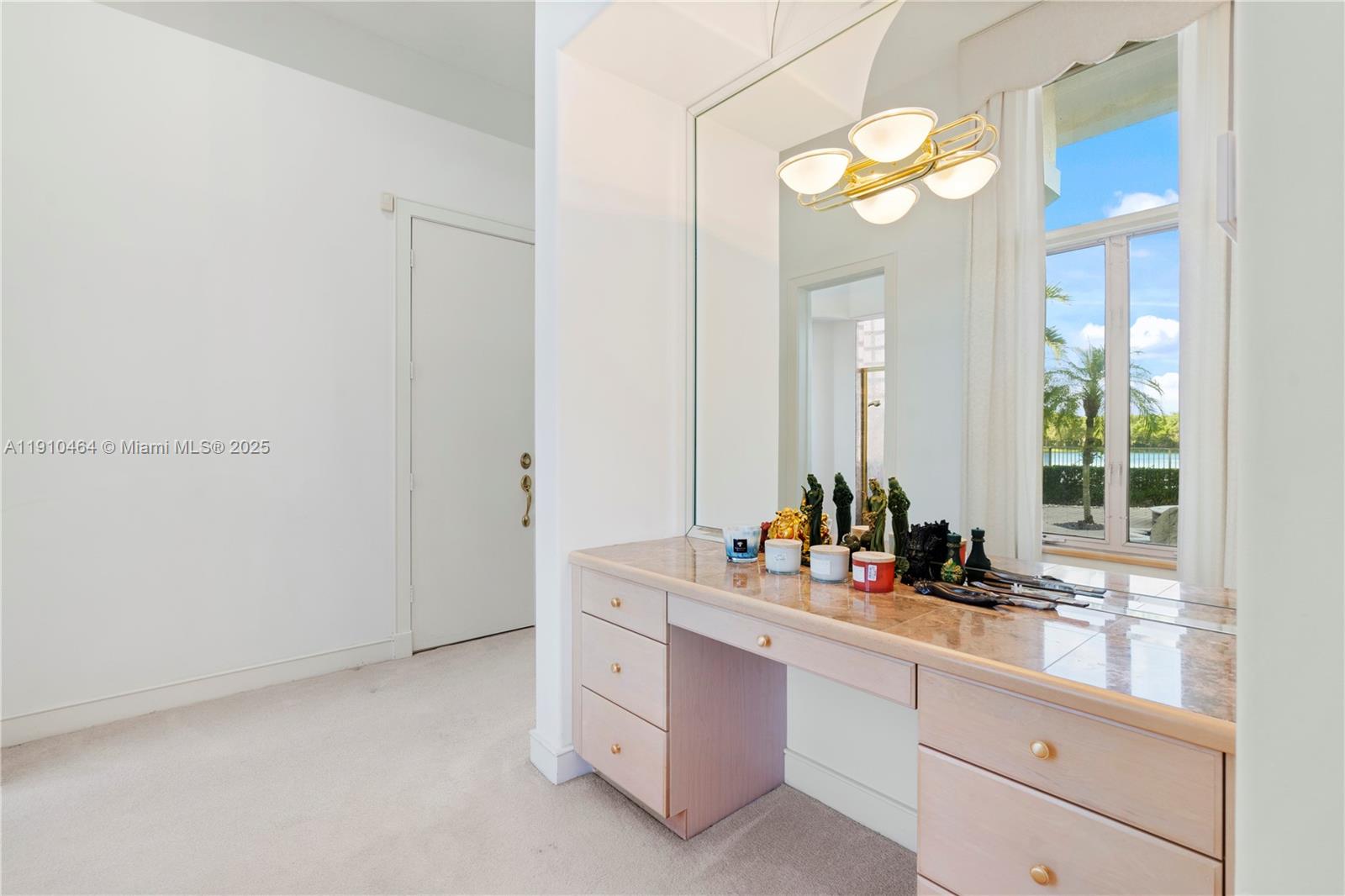 2939 Paddock Lane Weston, FL 33331 - Photo 36 of 59 a bathroom with a sink vanity and a mirror