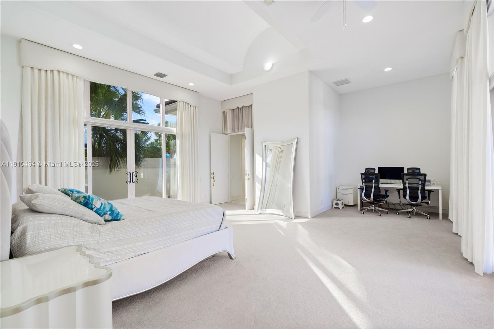 2939 Paddock Lane Weston, FL 33331 - Photo 38 of 59 a bedroom with furniture and a large window