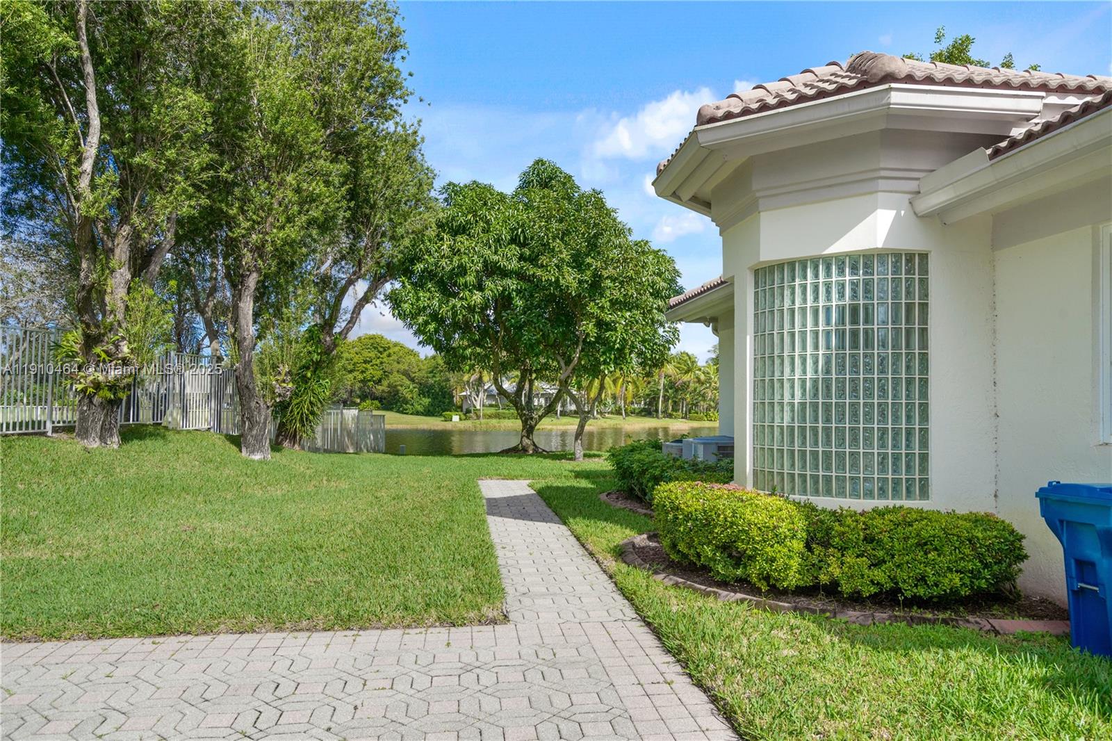 2939 Paddock Lane Weston, FL 33331 - Photo 58 of 59 a view of a house with a yard