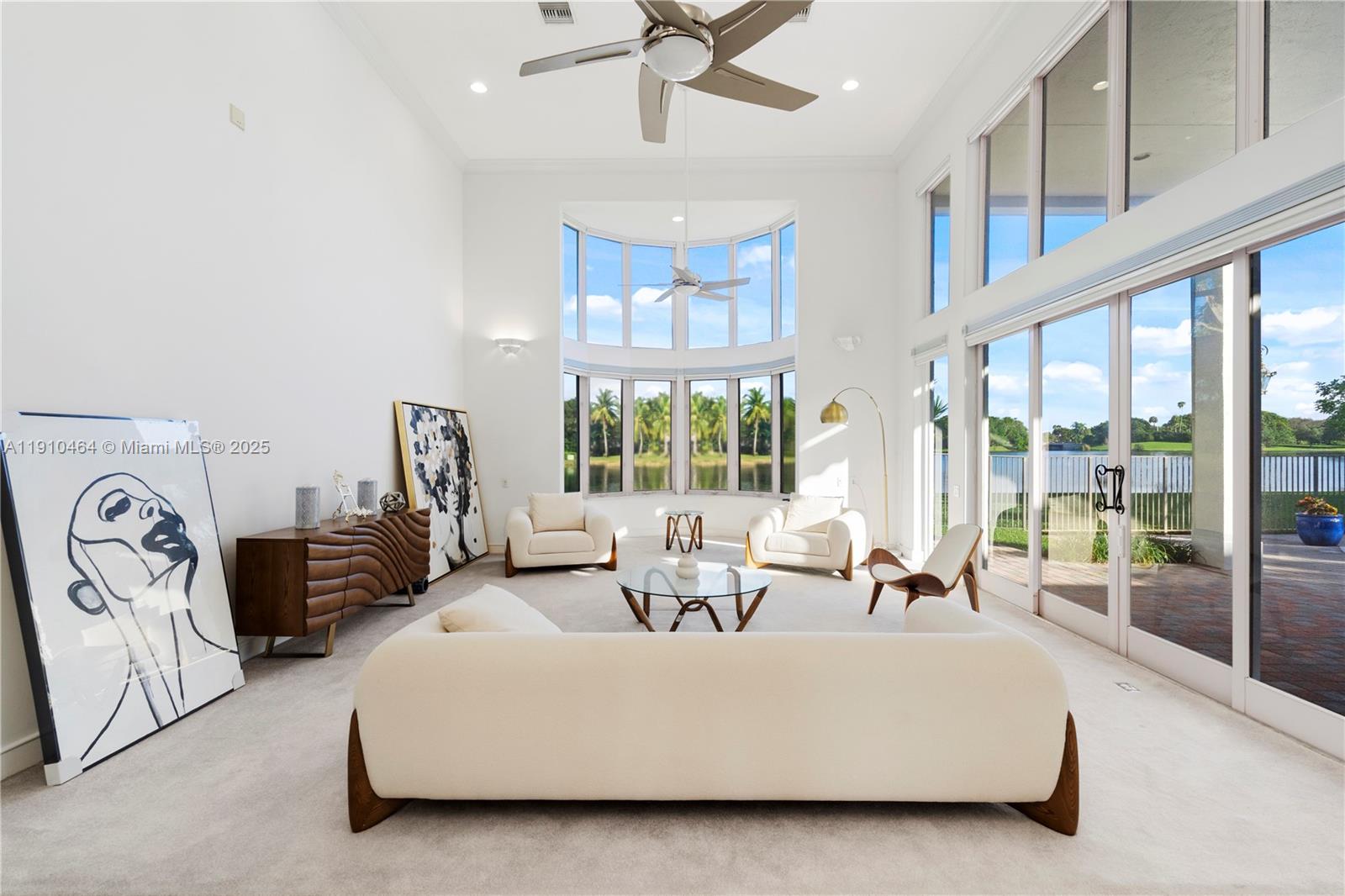 2939 Paddock Lane Weston, FL 33331 - Photo 9 of 59 a living room with furniture and a large window