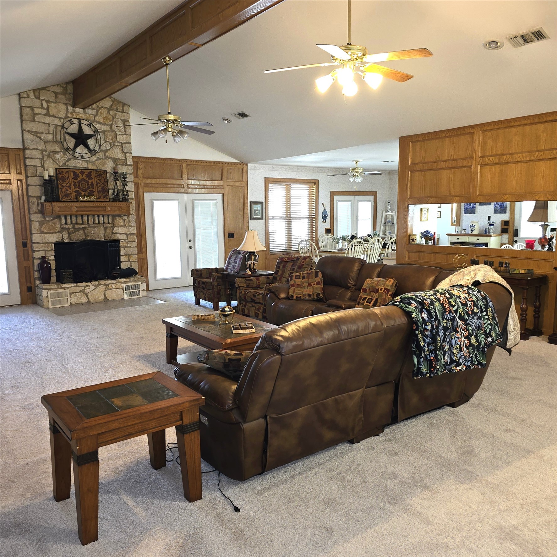 26 Westpoint Drive Trinity, TX 75862 - Photo 12 of 49 a living room with furniture a fireplace and a flat screen tv