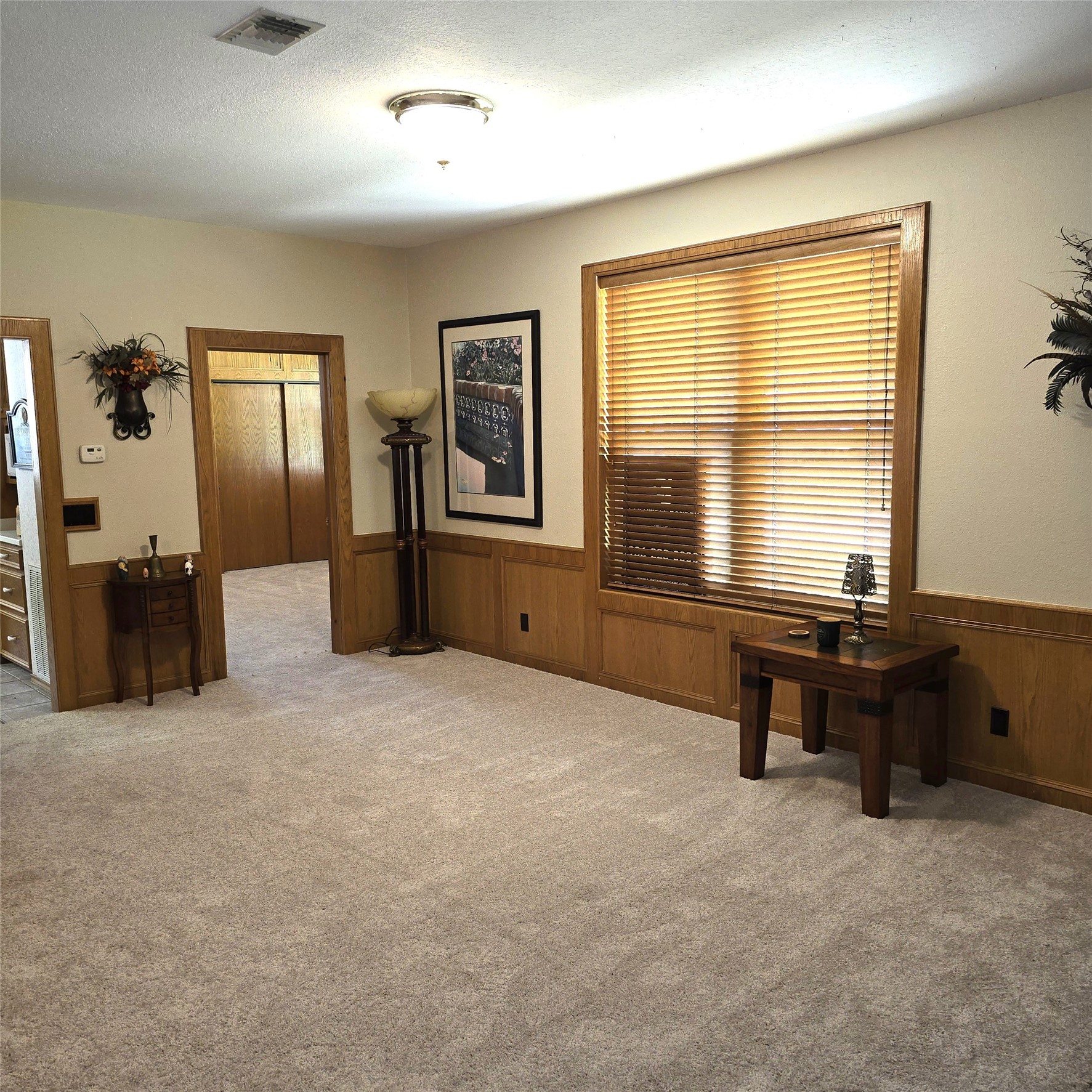 26 Westpoint Drive Trinity, TX 75862 - Photo 14 of 49 wooden floor and windows in a room