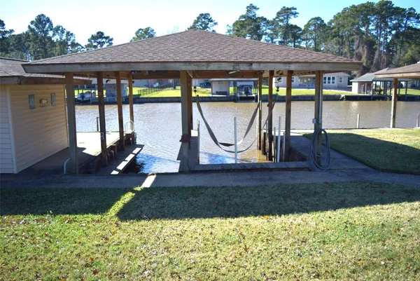a view of a backyard with a patio