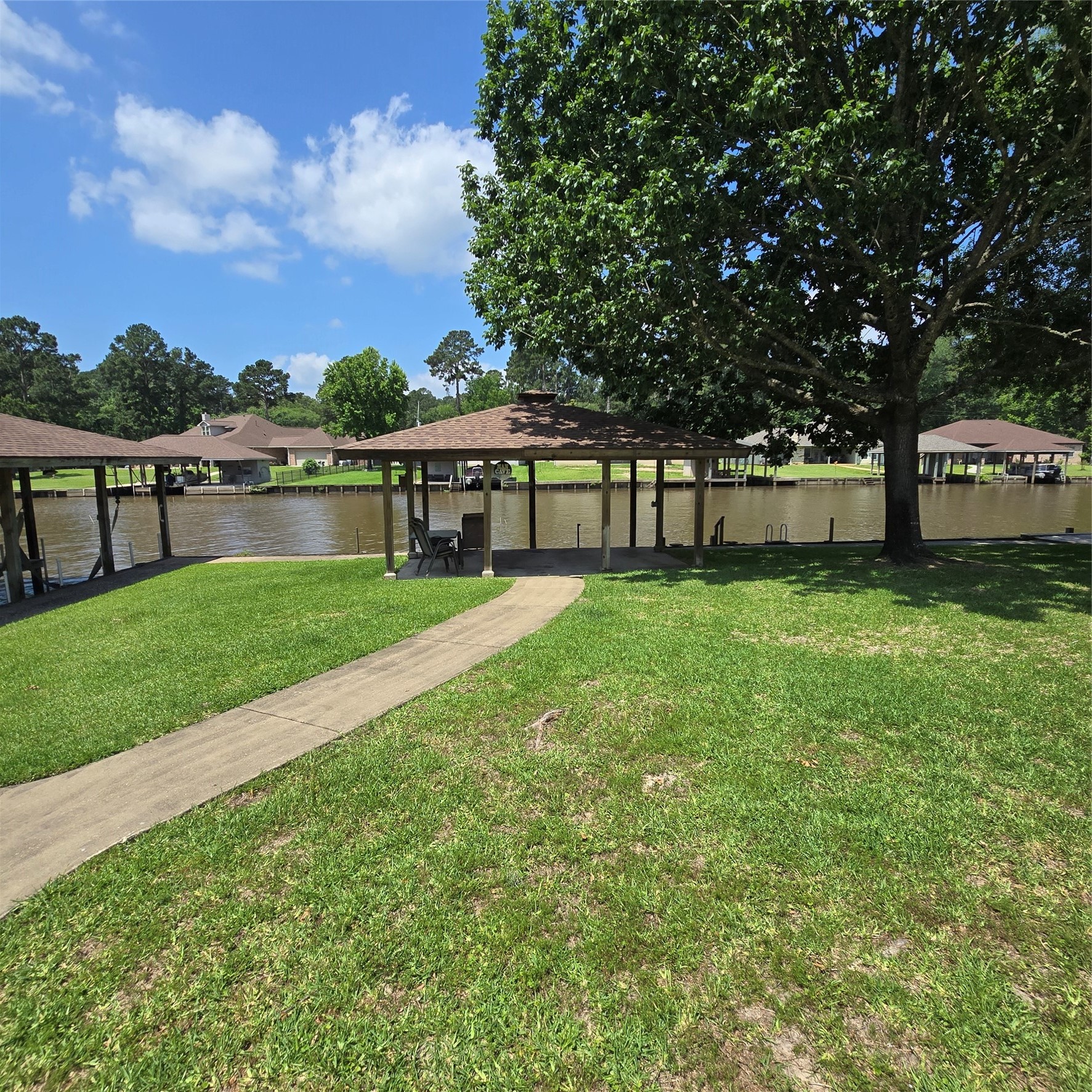 26 Westpoint Drive Trinity, TX 75862 - Photo 9 of 49 a house view with swimming pool in front of it