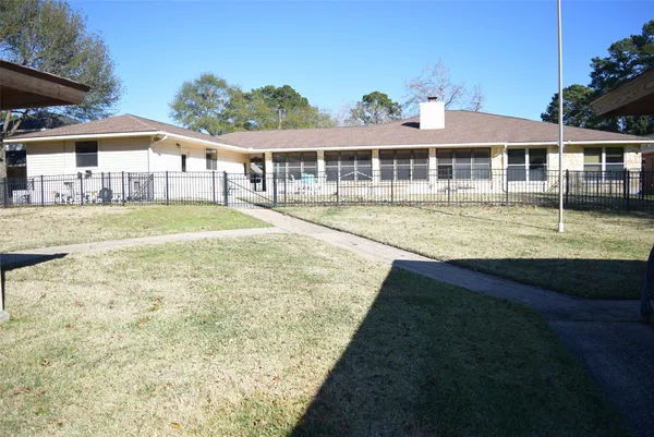 a view of house with outdoor space