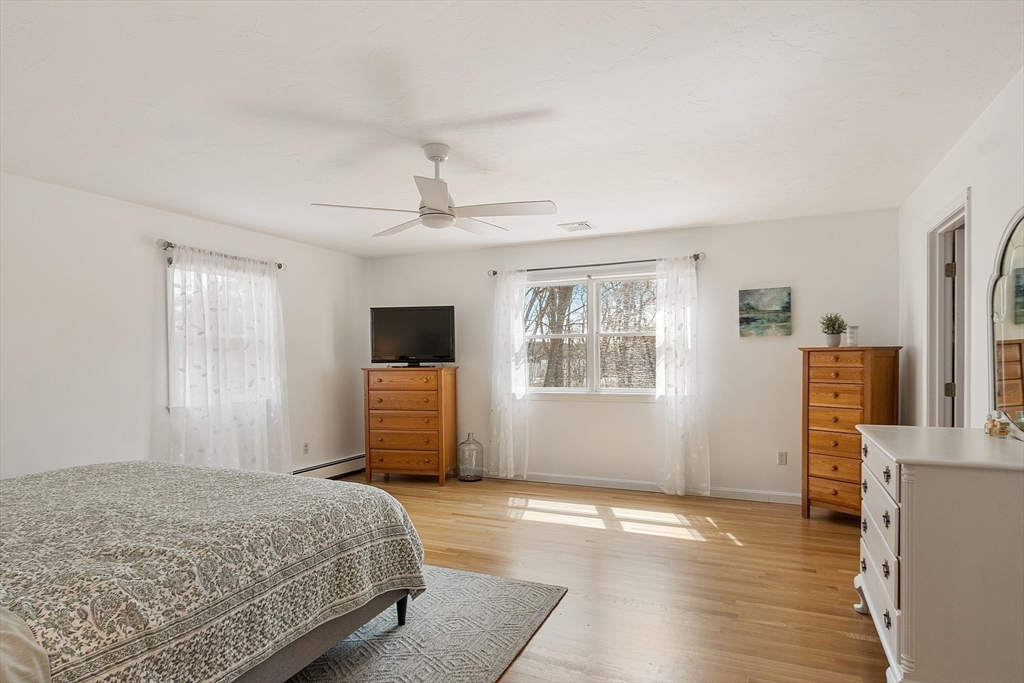 24 Washington Avenue Ashland, MA 01721 - Photo 15 of 30 a bedroom with a bed dresser and a window