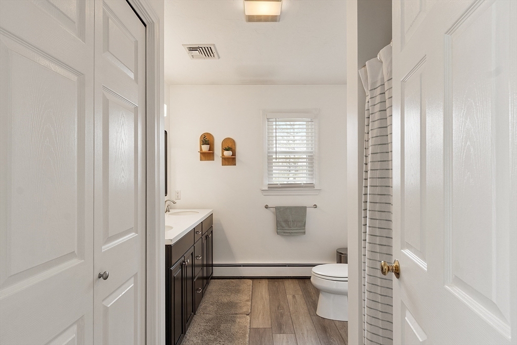 24 Washington Avenue Ashland, MA 01721 - Photo 17 of 30 a bathroom with a toilet and a shower