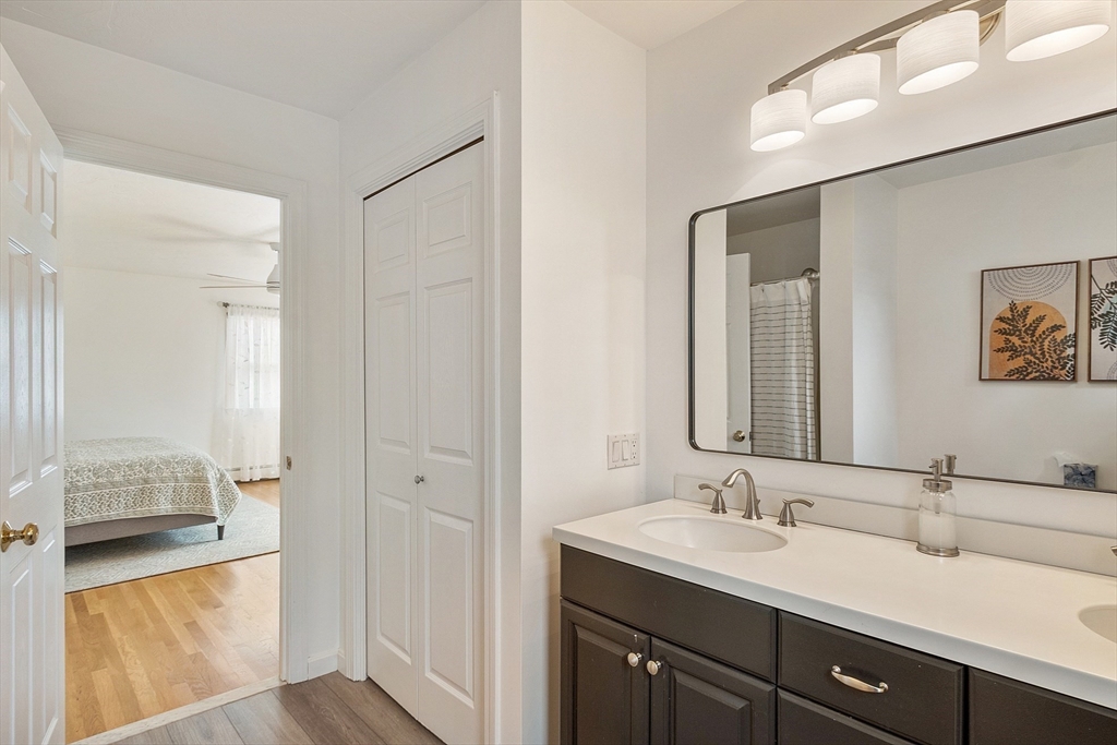 24 Washington Avenue Ashland, MA 01721 - Photo 18 of 30 a en suite bathroom with a sink and a mirror