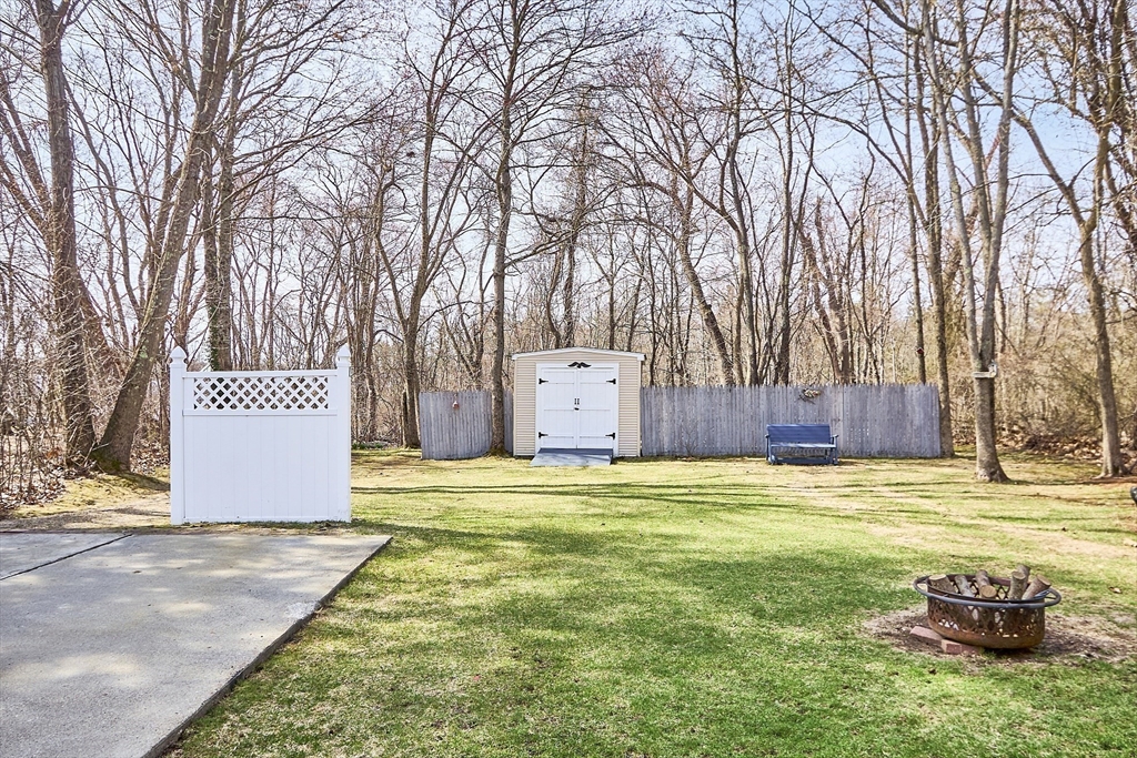 24 Washington Avenue Ashland, MA 01721 - Photo 2 of 30 a view of a back yard with trees