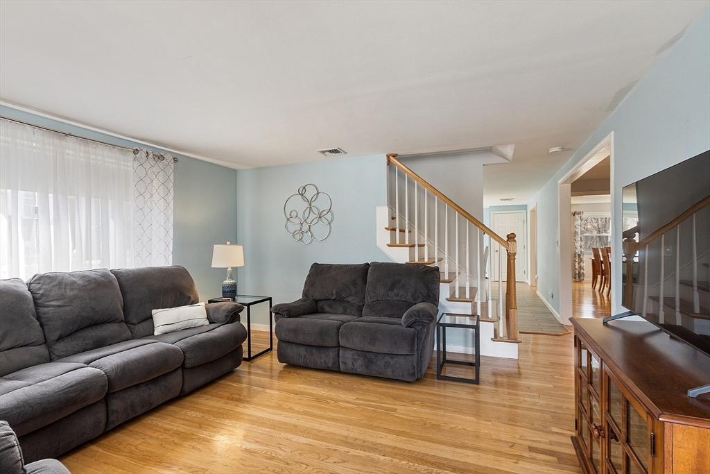 24 Washington Avenue Ashland, MA 01721 - Photo 9 of 30 a living room with furniture and a couch