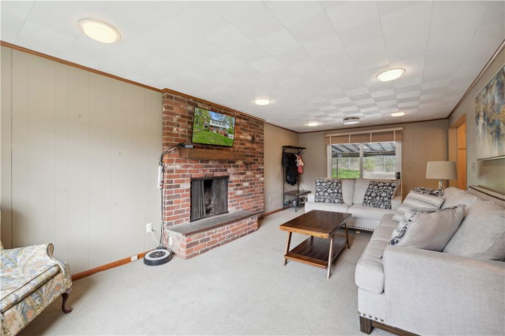 2 Lear Drive Pittsburgh, PA 15235 - Photo 19 of 43 a living room with furniture and a fireplace