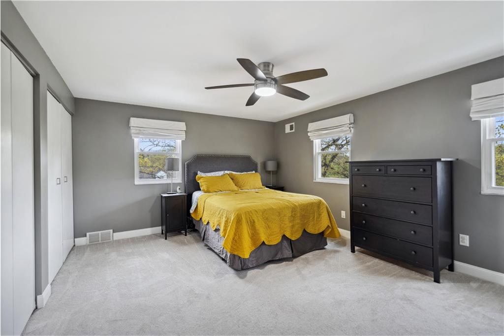 2 Lear Drive Pittsburgh, PA 15235 - Photo 23 of 43 a spacious bedroom with a bed and a ceiling fan