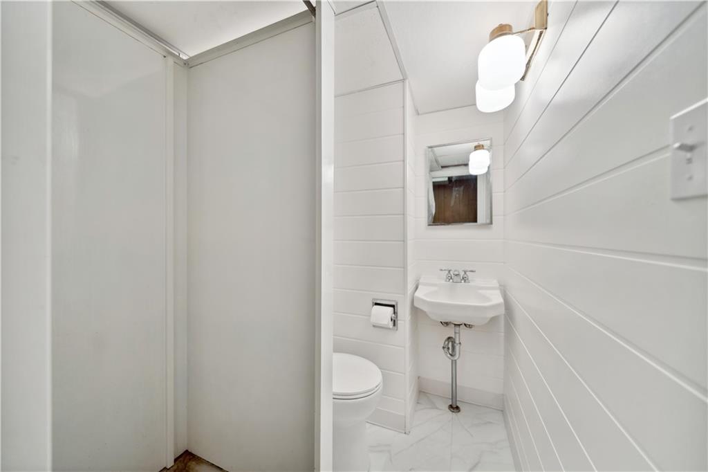 2 Lear Drive Pittsburgh, PA 15235 - Photo 34 of 43 a bathroom with a toilet a sink and mirror