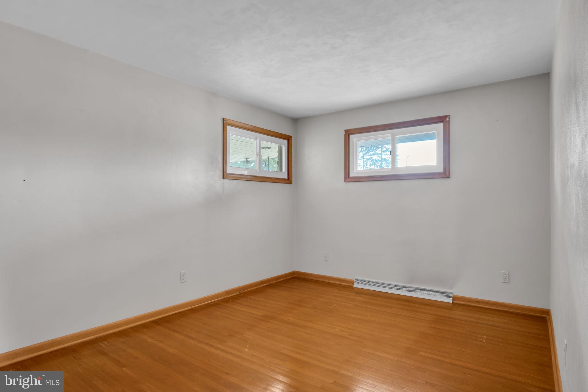 301 East Elm Avenue Hanover, PA 17331 - Photo 17 of 46 a view of empty room with wooden floor