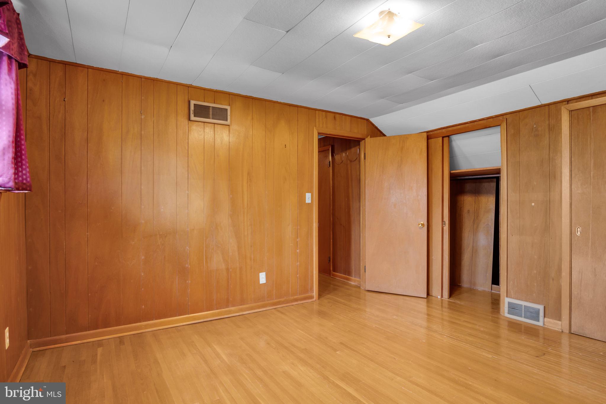 301 East Elm Avenue Hanover, PA 17331 - Photo 22 of 46 a view of an empty room with wooden floor