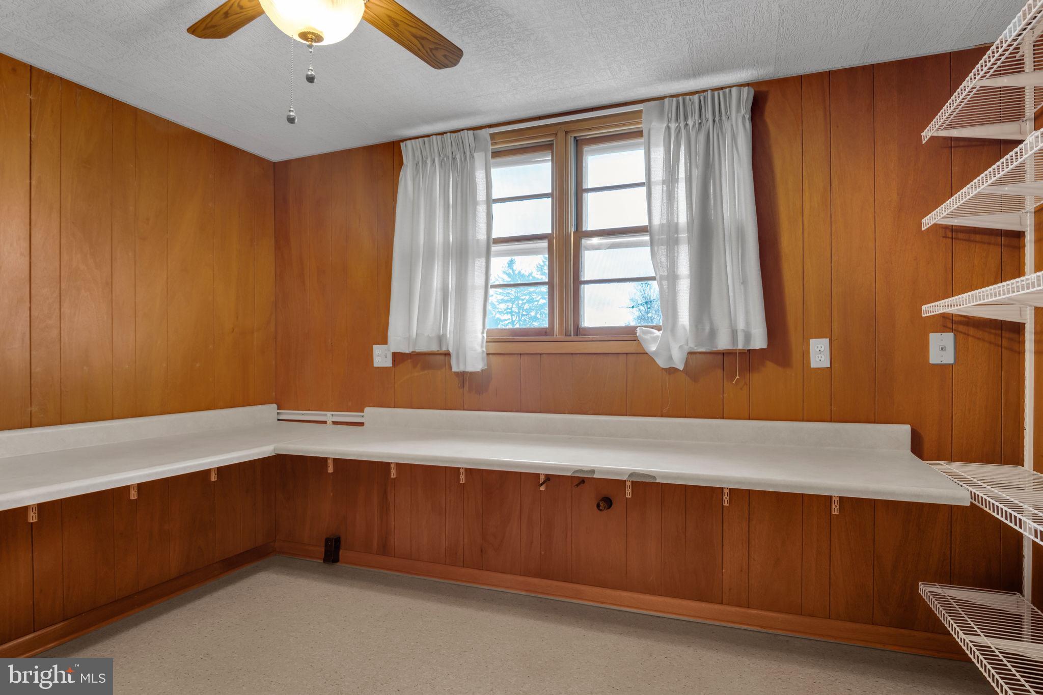 301 East Elm Avenue Hanover, PA 17331 - Photo 24 of 46 a room with window and ceiling fan