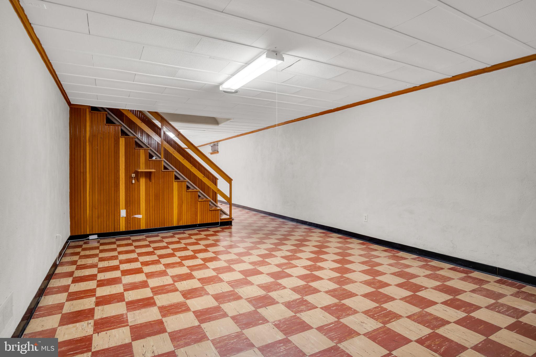 301 East Elm Avenue Hanover, PA 17331 - Photo 29 of 46 a view of a room with a black white checkered floor
