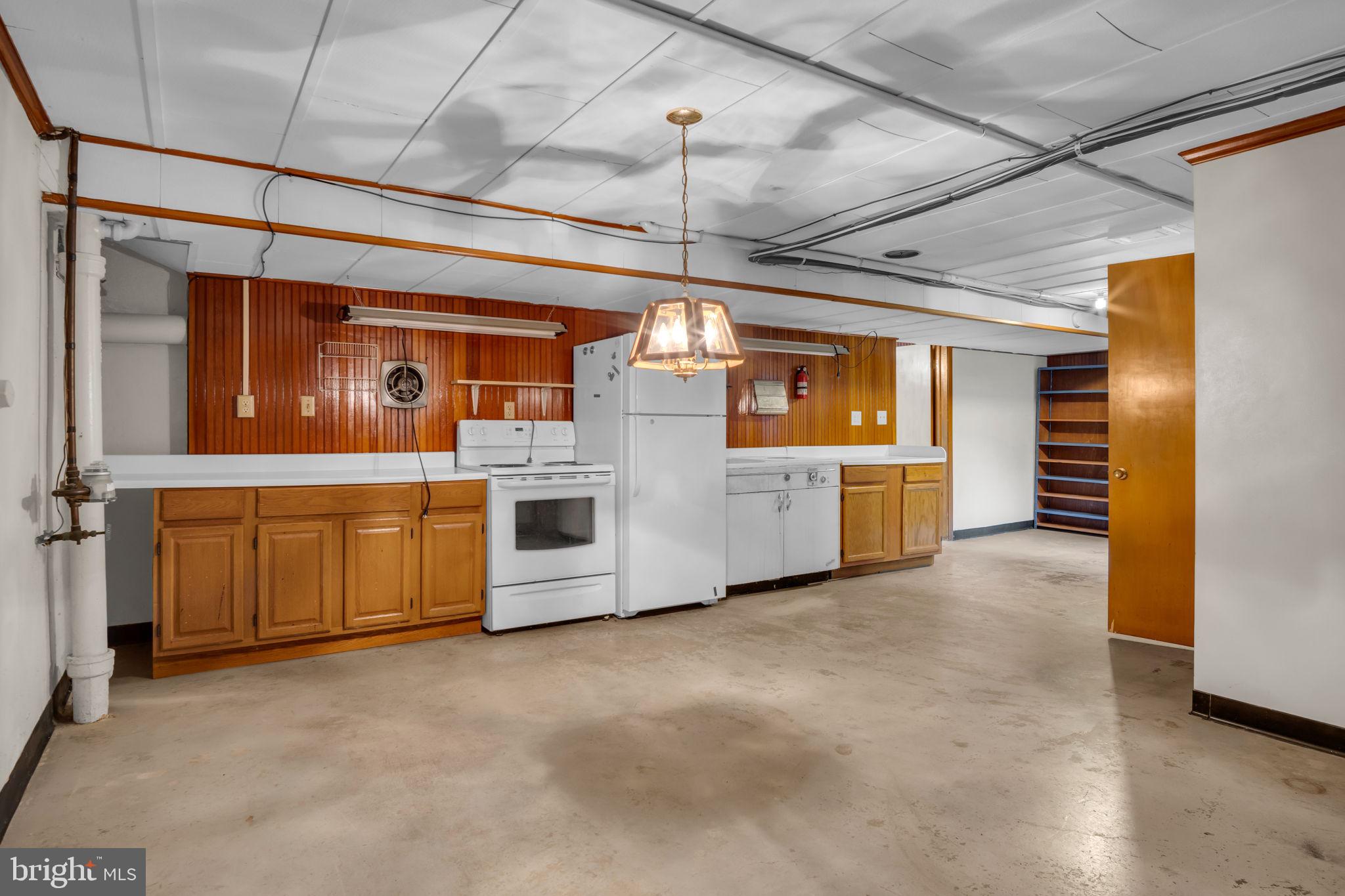 301 East Elm Avenue Hanover, PA 17331 - Photo 32 of 46 a view of a kitchen with refrigerator and windows