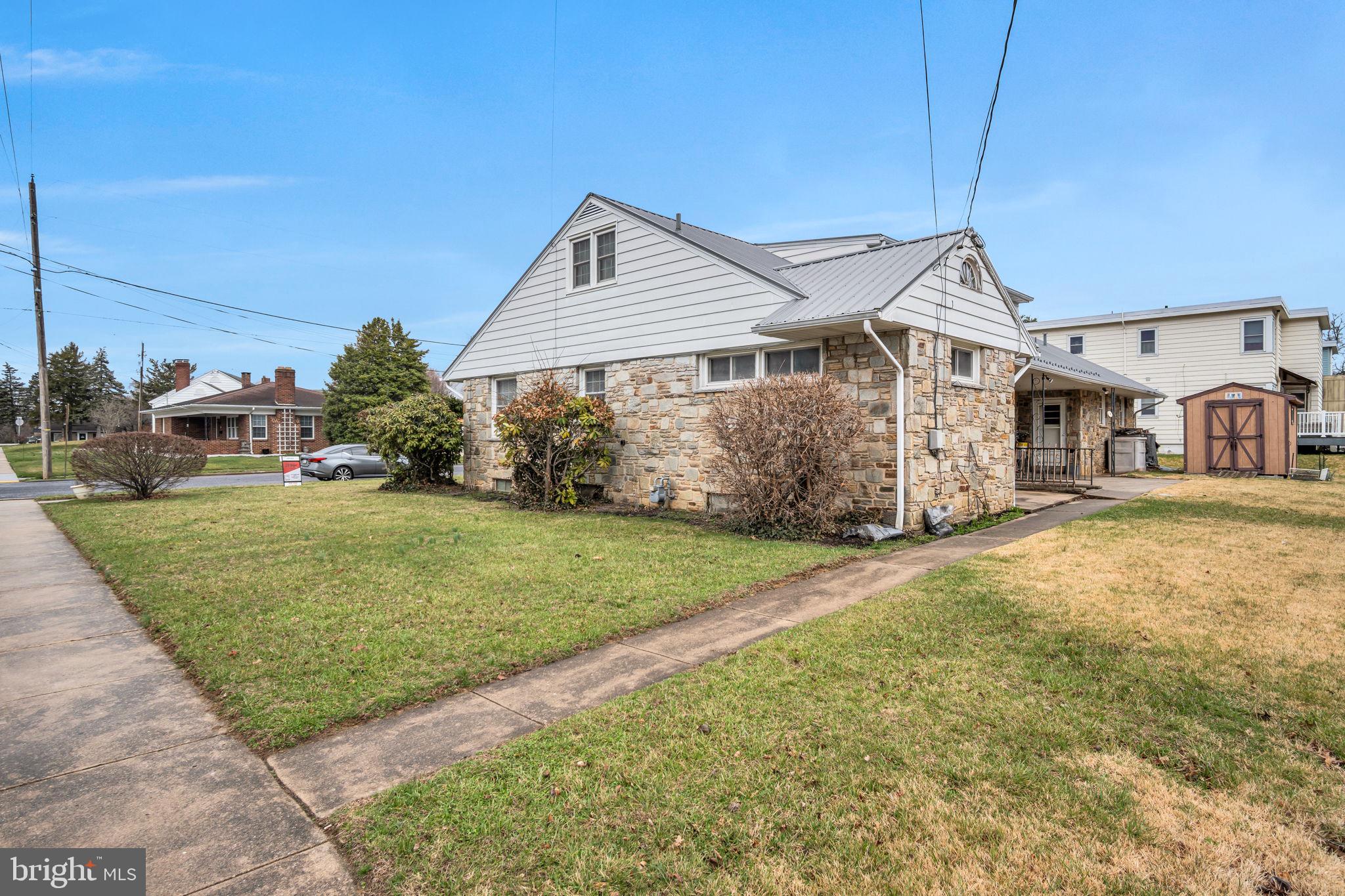 301 East Elm Avenue Hanover, PA 17331 - Photo 41 of 46 a front view of a house with a yard