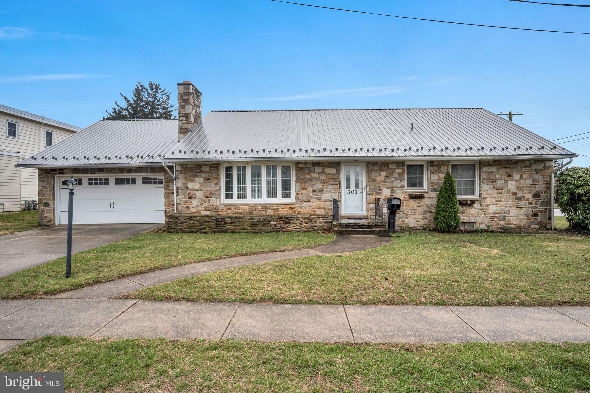 301 East Elm Avenue Hanover, PA 17331 - Photo 43 of 46 a view of a house with backyard and garden