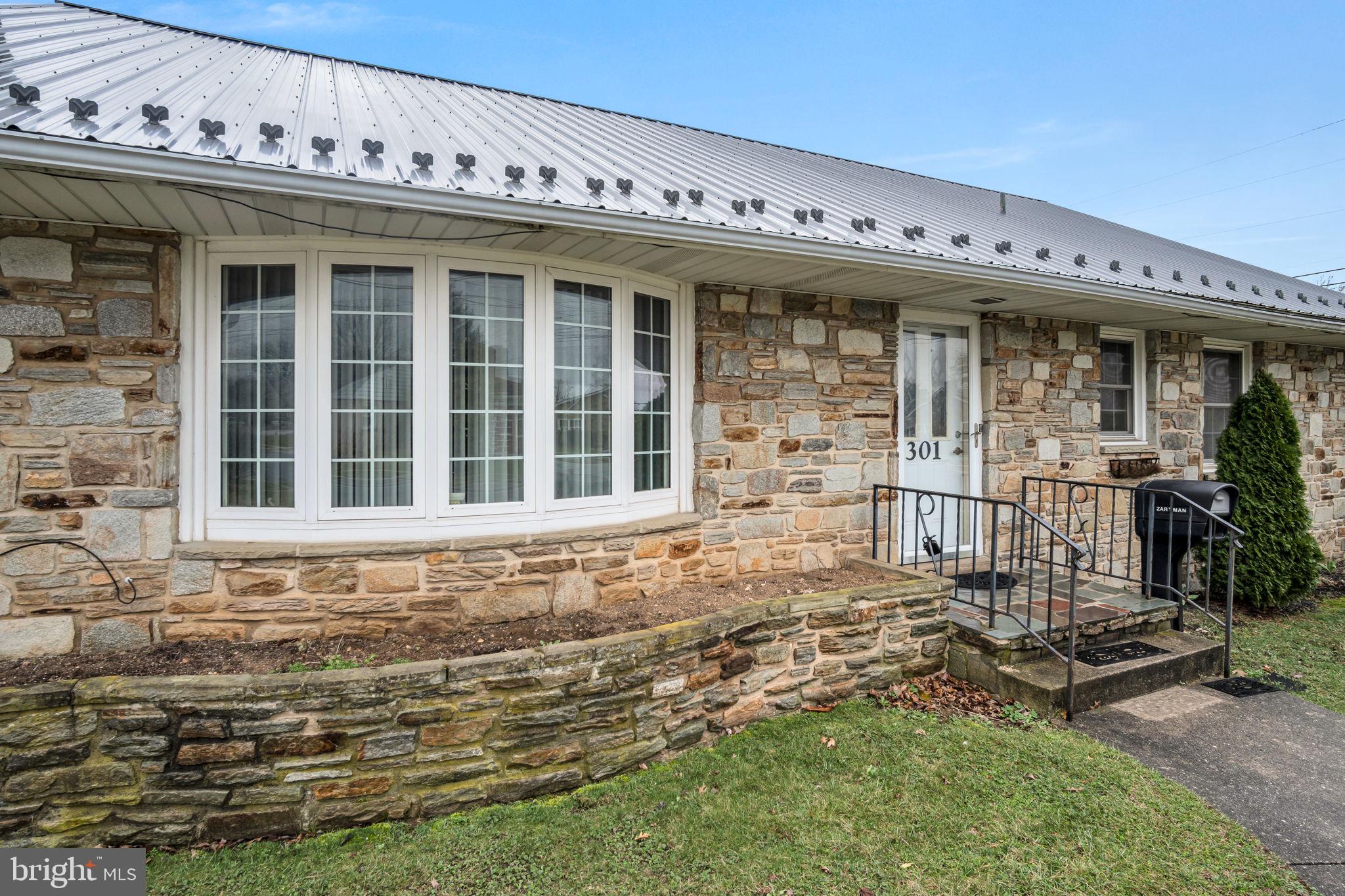 301 East Elm Avenue Hanover, PA 17331 - Photo 44 of 46 a front view of a house with a porch