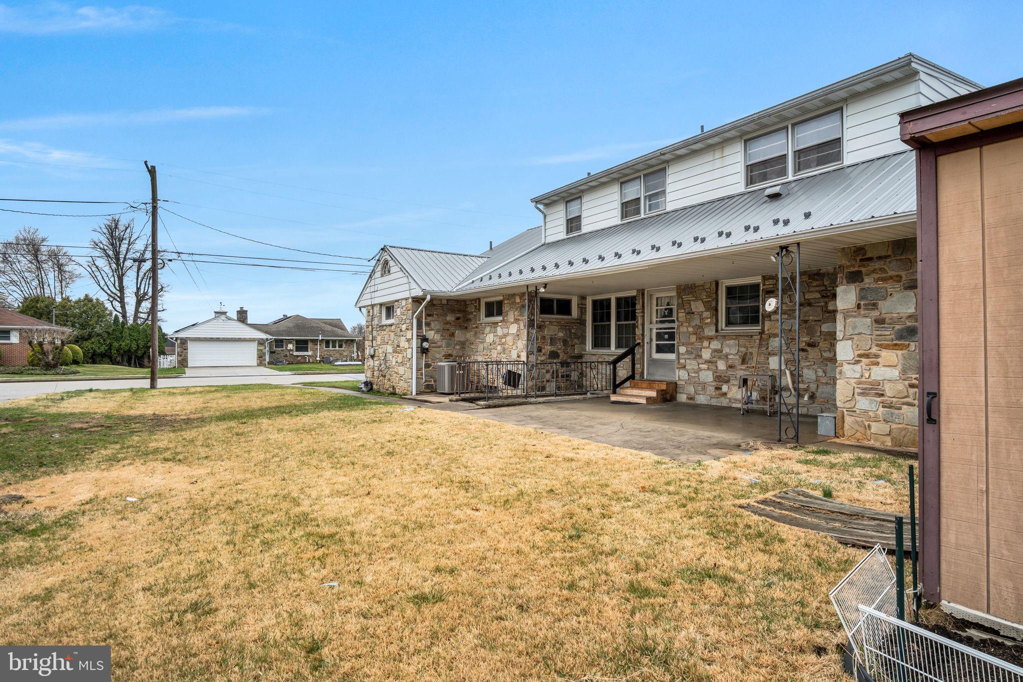 301 East Elm Avenue Hanover, PA 17331 - Photo 45 of 46 a front view of a building with a yard