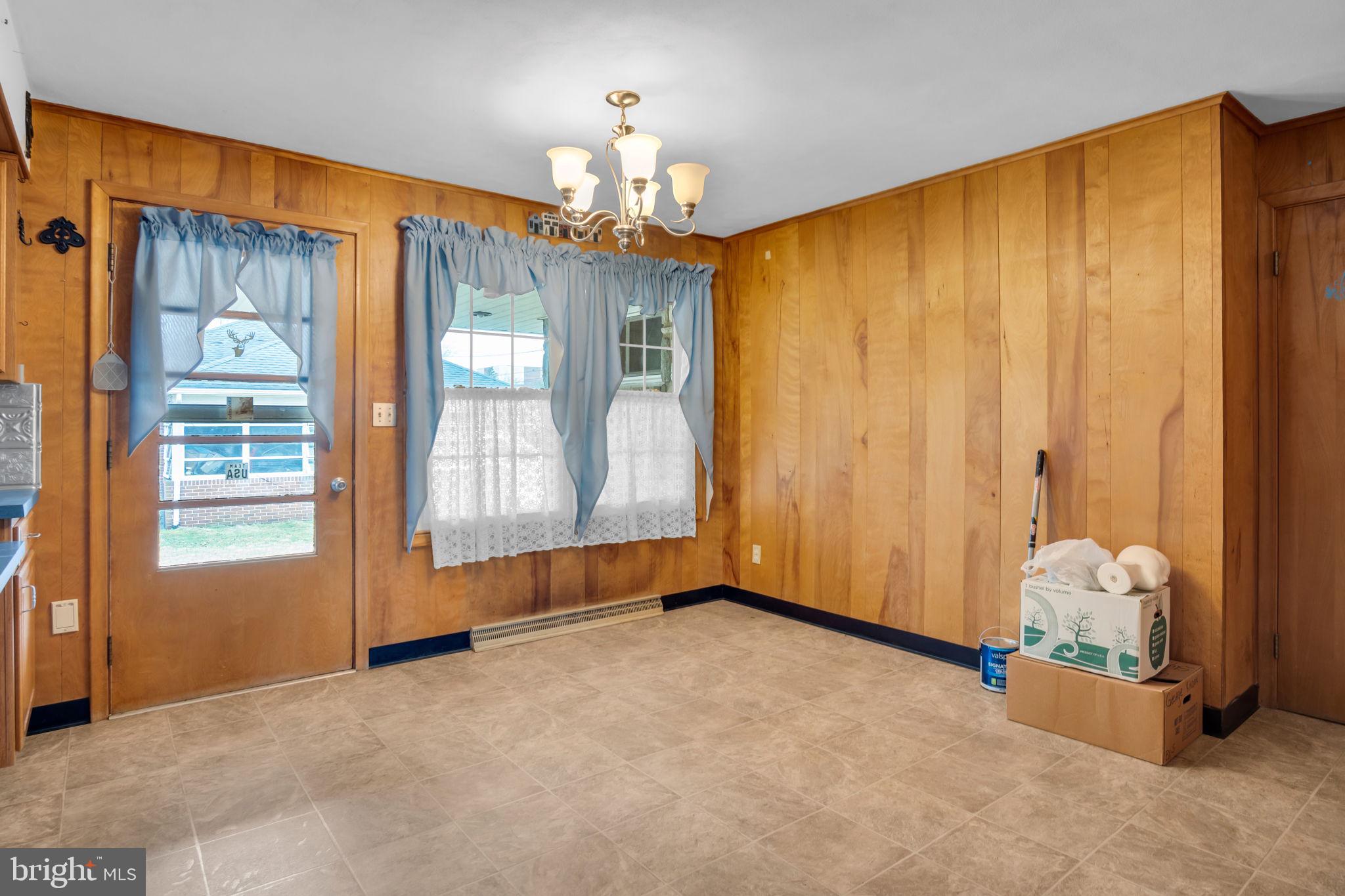 301 East Elm Avenue Hanover, PA 17331 - Photo 6 of 46 a view of an empty room with a window