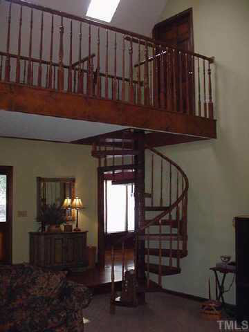 4506 Pearces Road Zebulon, NC 27597 - Photo 7 of 10 a view of front door with entryway