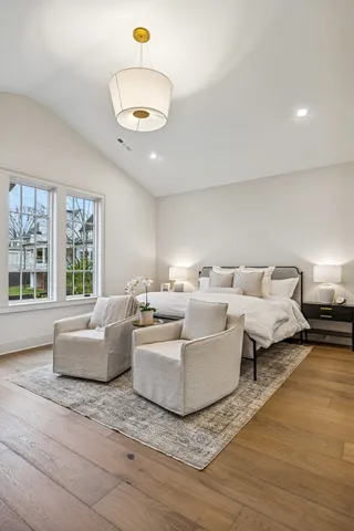 a spacious bathroom with double sink and a mirror