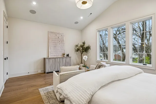 a bathroom with a shower and a sink