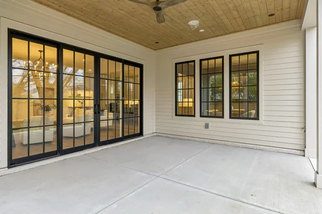a view of a living room with a large window