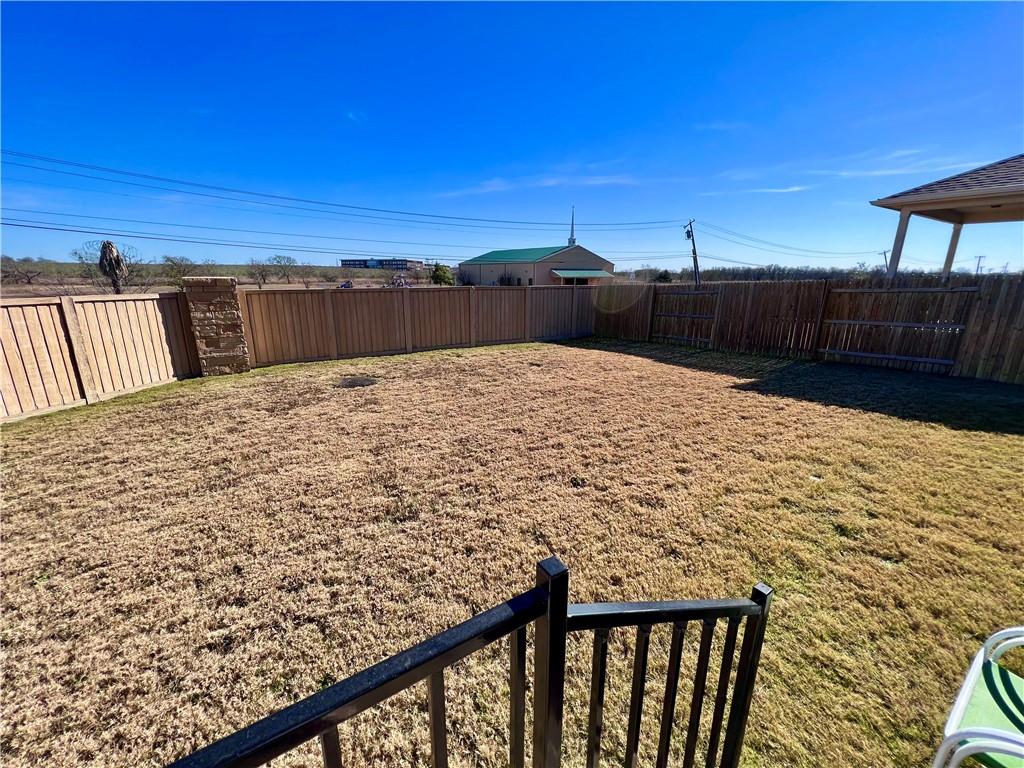 19733 Cherubini Trail Pflugerville, TX 78660 - Photo 24 of 24 View of fenced backyard