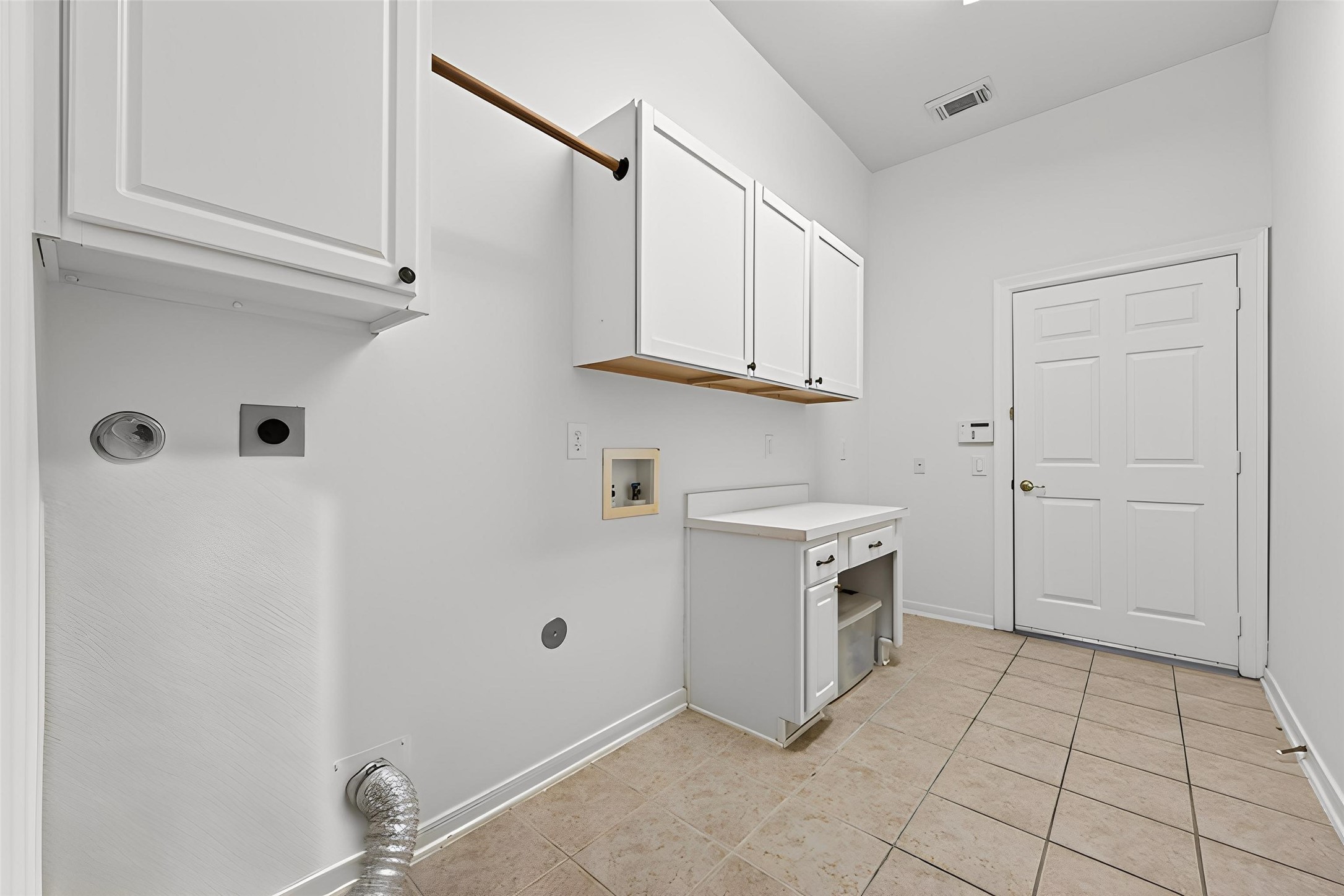 27 Sovereign Way Conroe, TX 77384 - Photo 39 of 49 Laundry room with storage & counter space