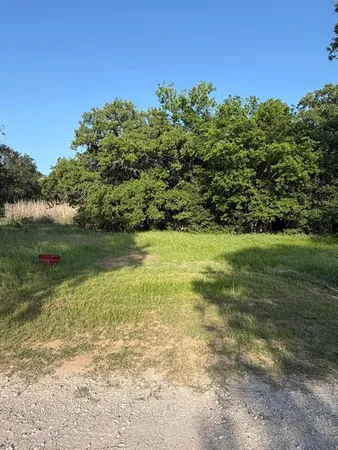a view of a lake with a big yard