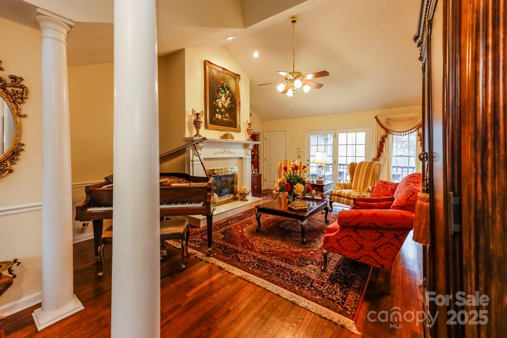173 Sherry Street Rutherfordton, NC 28139 - Photo 11 of 33 a living room with furniture a rug and a chandelier