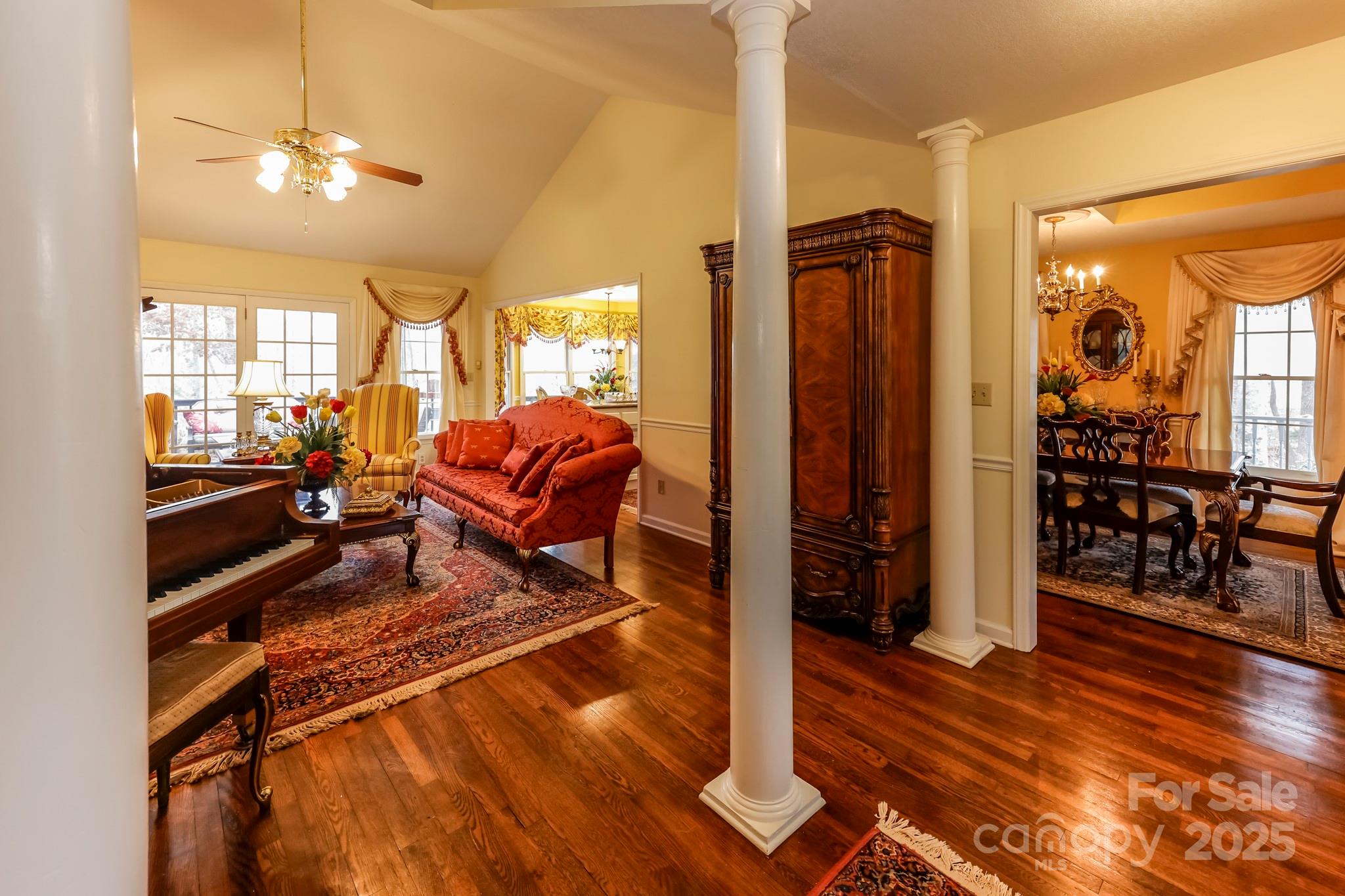 173 Sherry Street Rutherfordton, NC 28139 - Photo 13 of 33 a living room with furniture a wooden floor and next to a window