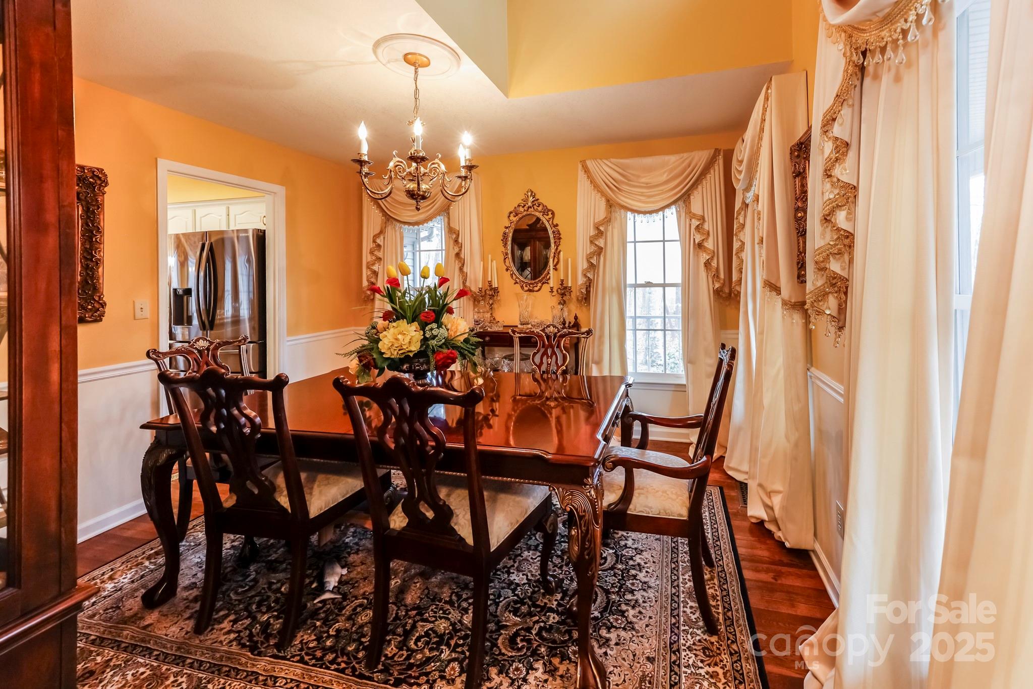 173 Sherry Street Rutherfordton, NC 28139 - Photo 14 of 33 a view of a dining room with furniture and a chandelier