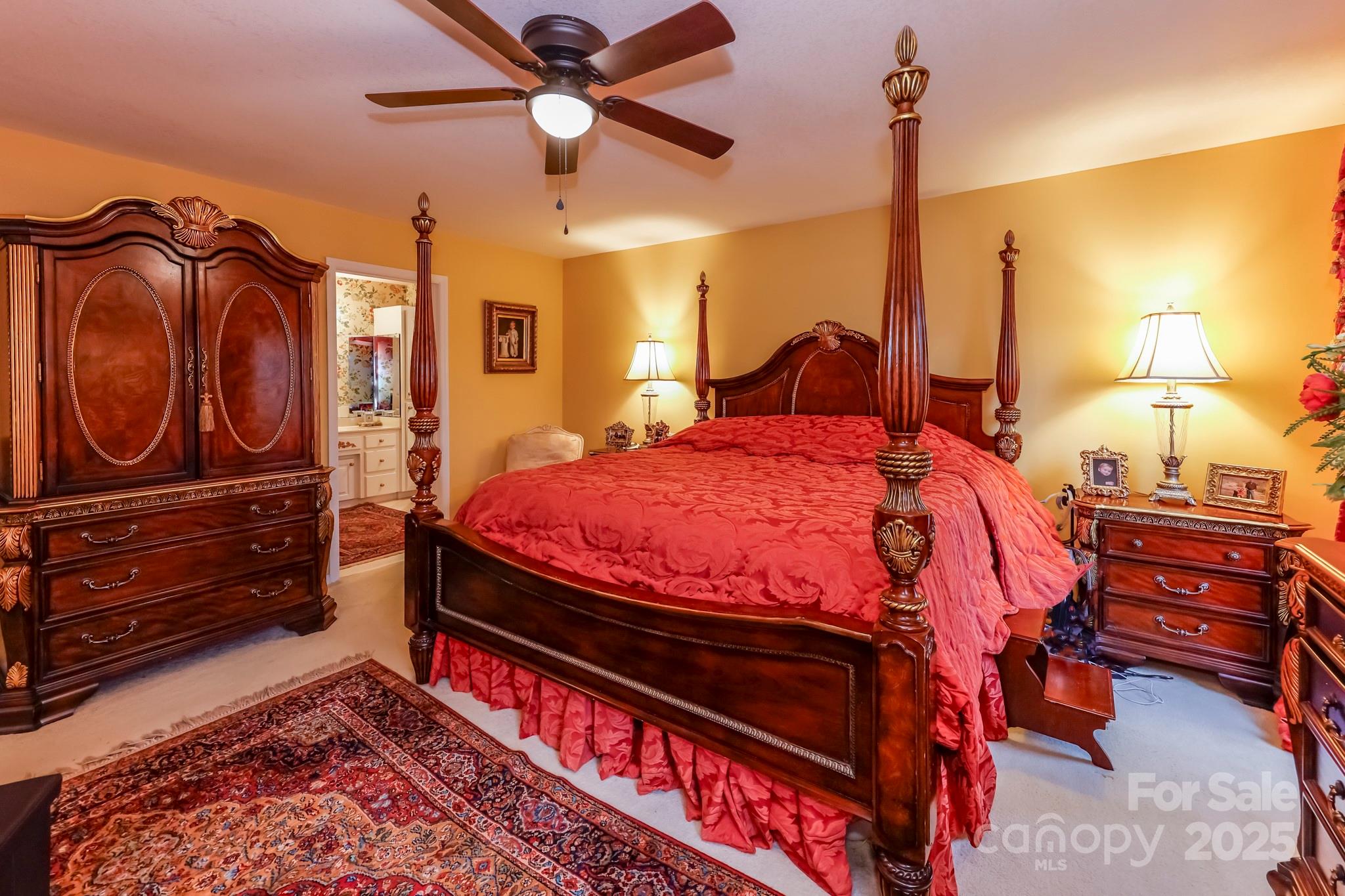 173 Sherry Street Rutherfordton, NC 28139 - Photo 24 of 33 a bedroom with a bed and wooden floor