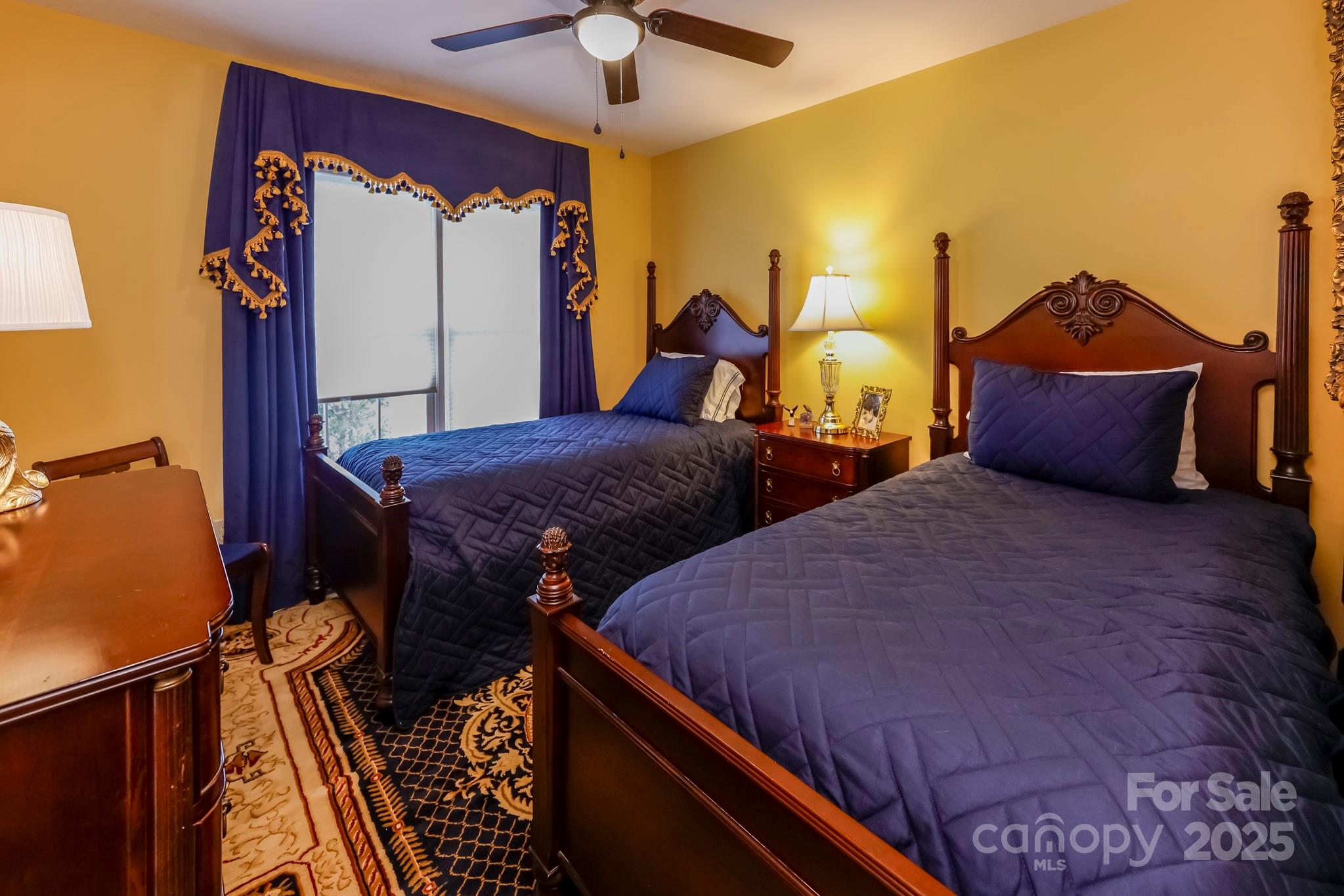 173 Sherry Street Rutherfordton, NC 28139 - Photo 29 of 33 a bedroom with two beds and painted walls