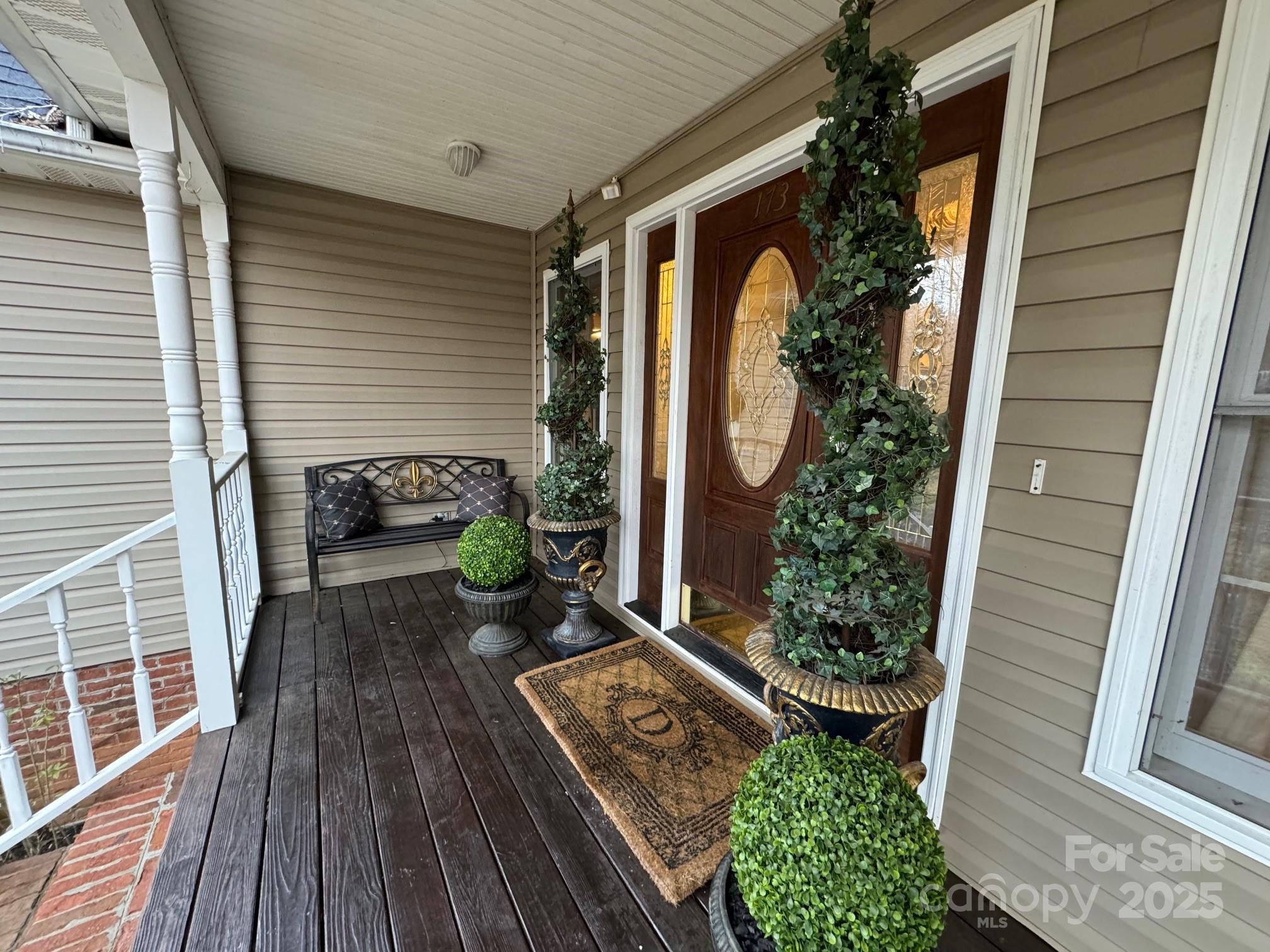 173 Sherry Street Rutherfordton, NC 28139 - Photo 5 of 33 a view of a house with backyard and sitting area