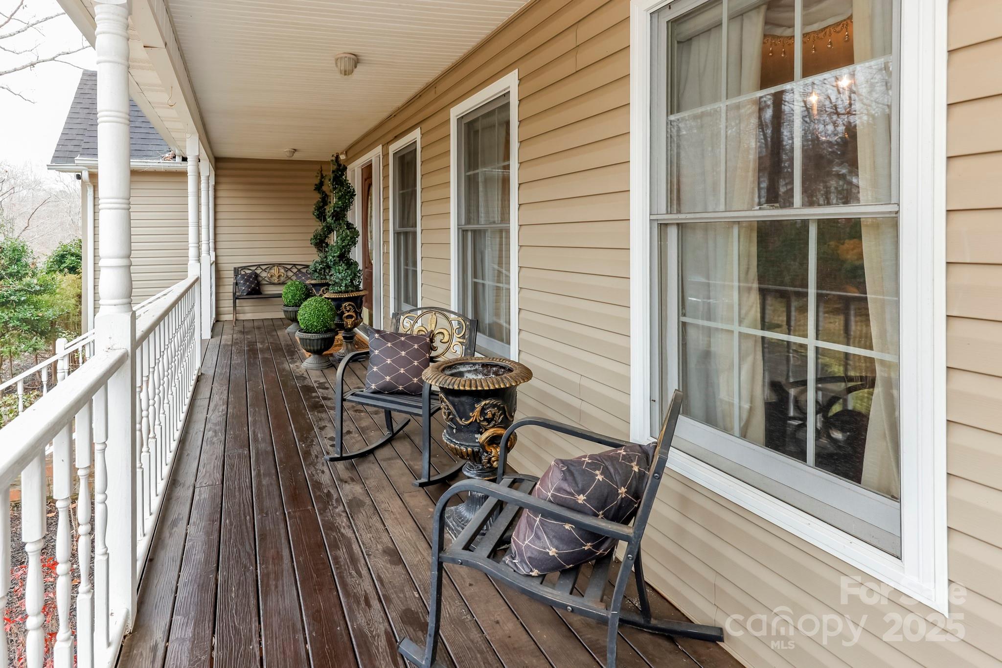 173 Sherry Street Rutherfordton, NC 28139 - Photo 8 of 33 a view of balcony with chairs and wooden floor