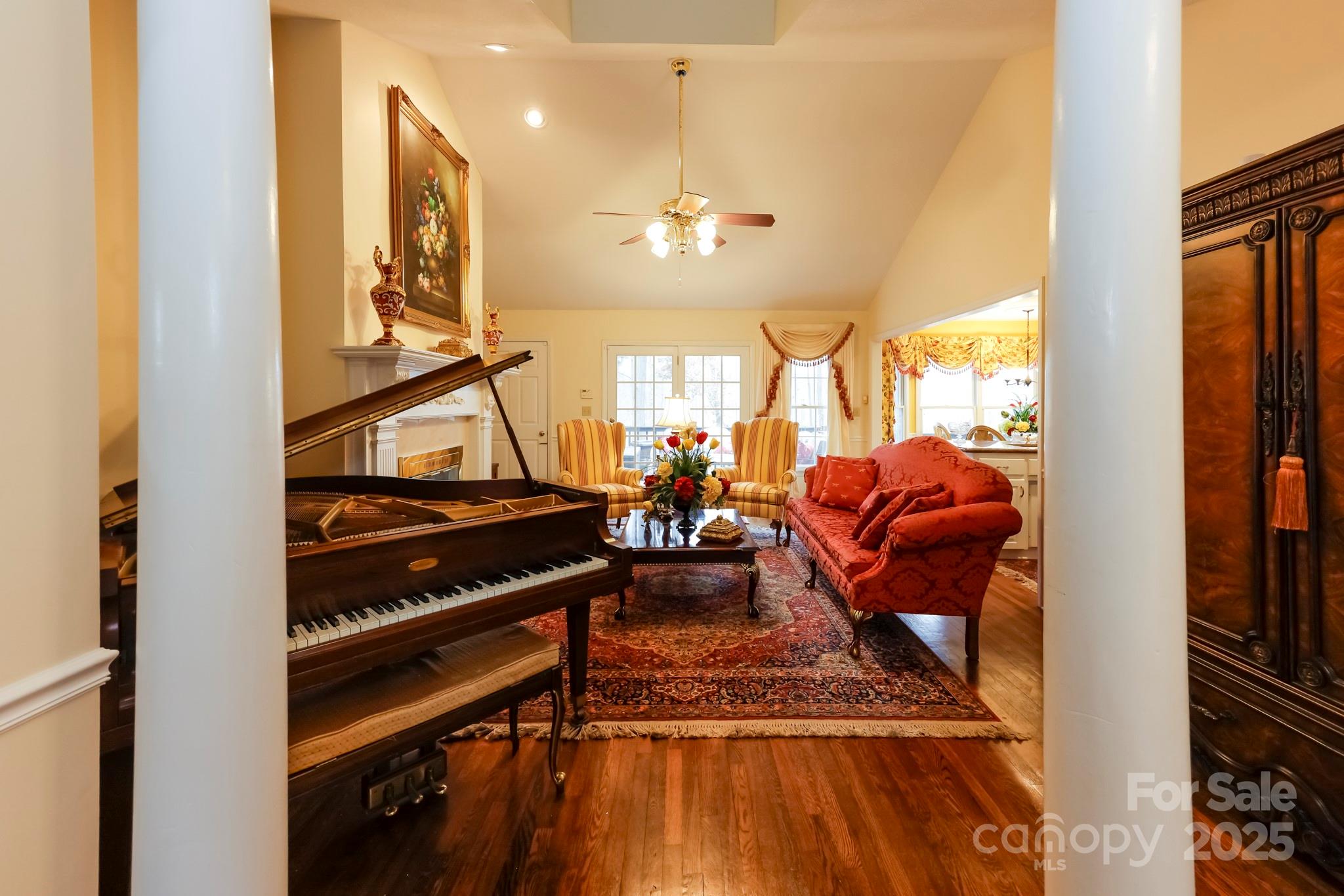 173 Sherry Street Rutherfordton, NC 28139 - Photo 10 of 33 a living room with furniture a rug and a chandelier
