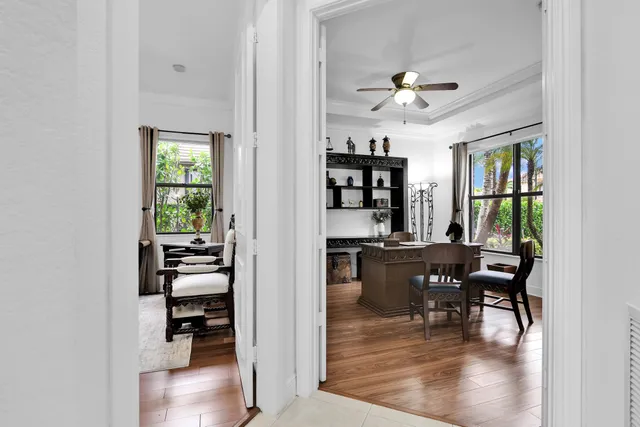 a en suite bathroom with a toilet sink and a mirror