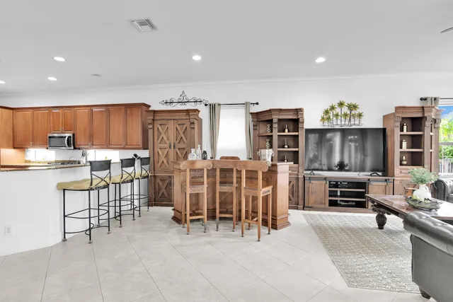 $10,000 | 10703 Versailles Boulevard, Wellington, FL 33449